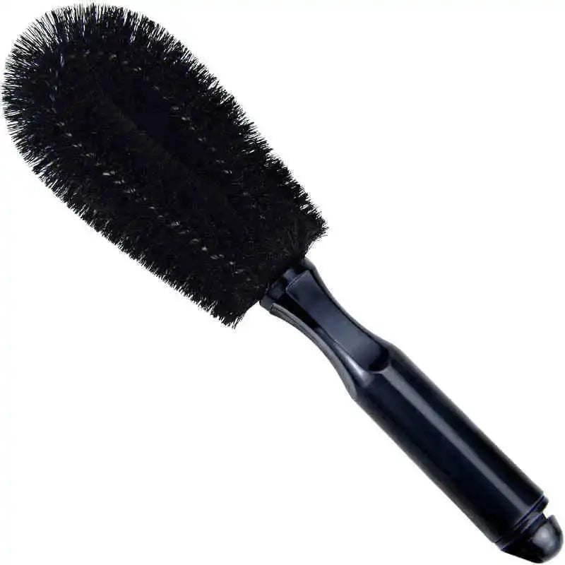 Car wheel cleaning brush by Simples Market; black nylon bristles and black plastic handle.