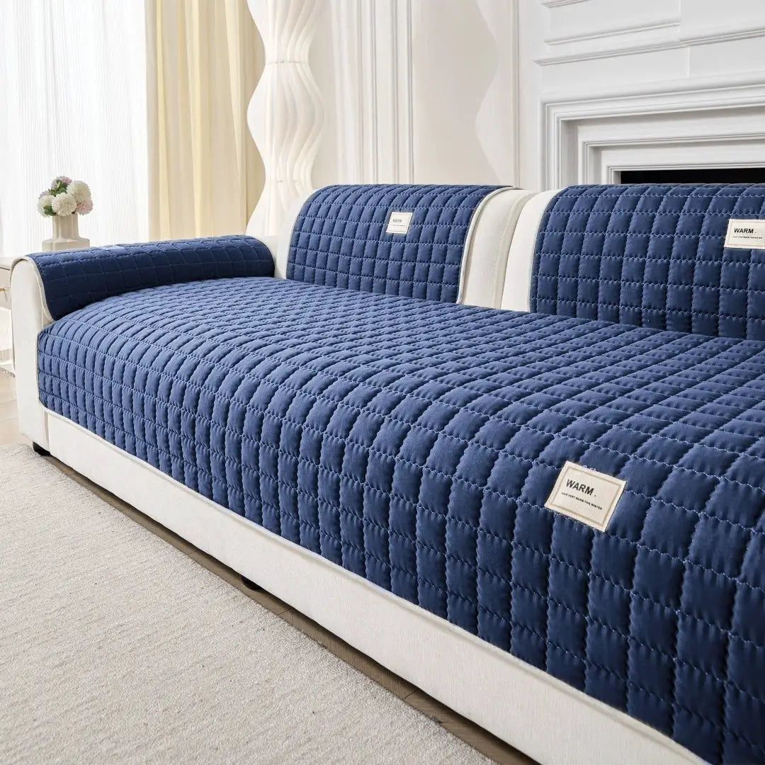 Sofa cover Simples Market navy blue quilted anti-slip on beige sofa