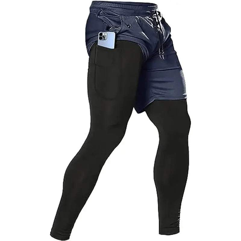 Men's 2-in-1 athletic pants with navy outer shorts over black leggings for gym workouts