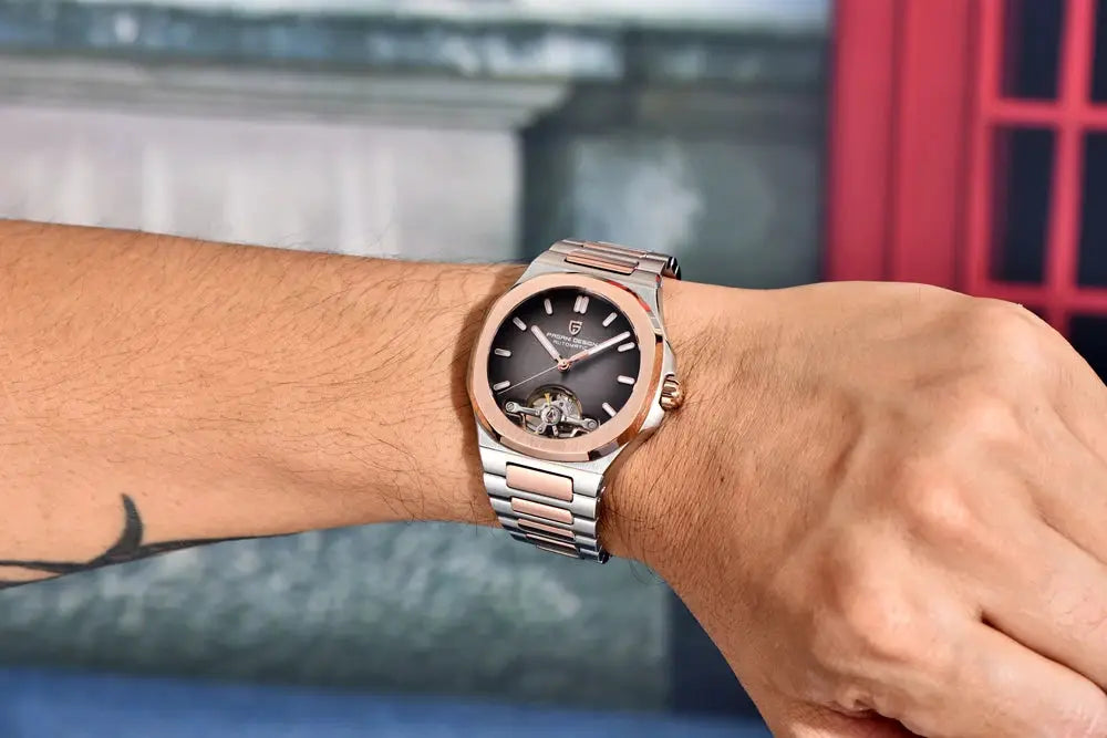 Pagani Design men's skeleton automatic wristwatch, two-tone stainless steel with rose-gold bezel on a silver bracelet