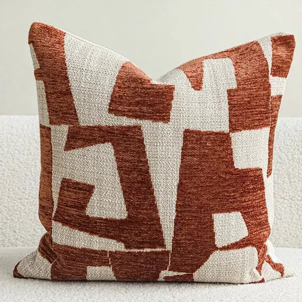 Decorative pillow cover in ivory and rust red geometric pattern for sofa or chair