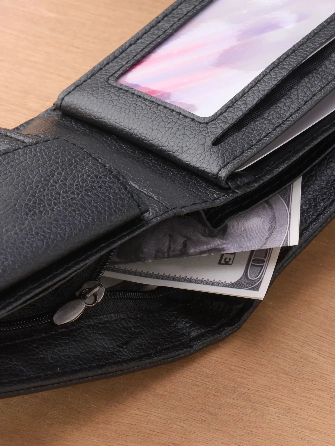 Men's black leather zipper wallet with coin pocket and multiple card slots.