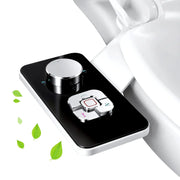 SAMODRA bidet attachment control panel on a black glossy surface with a large chrome dial by Simples Market
