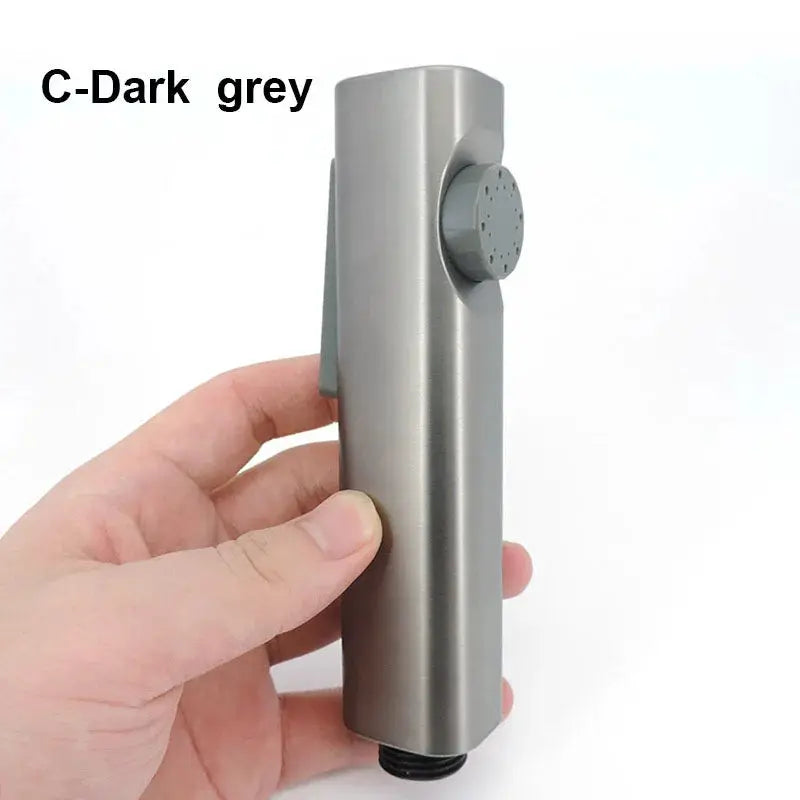 Handheld bidet sprayer in dark grey ABS, self-cleaning bathroom accessory