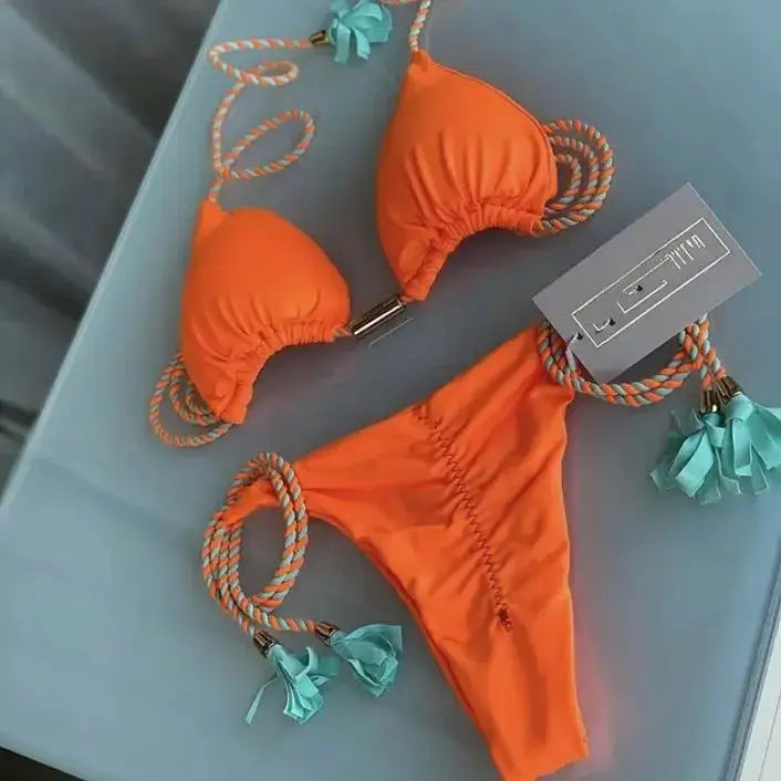 Simples Market orange backless rope triangle bikini with braided multicolor straps and teal tassel accents