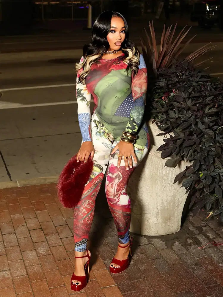 Sisterlinda hip jumpsuit for women in a colorful print with o-neck, full sleeves and skinny fit