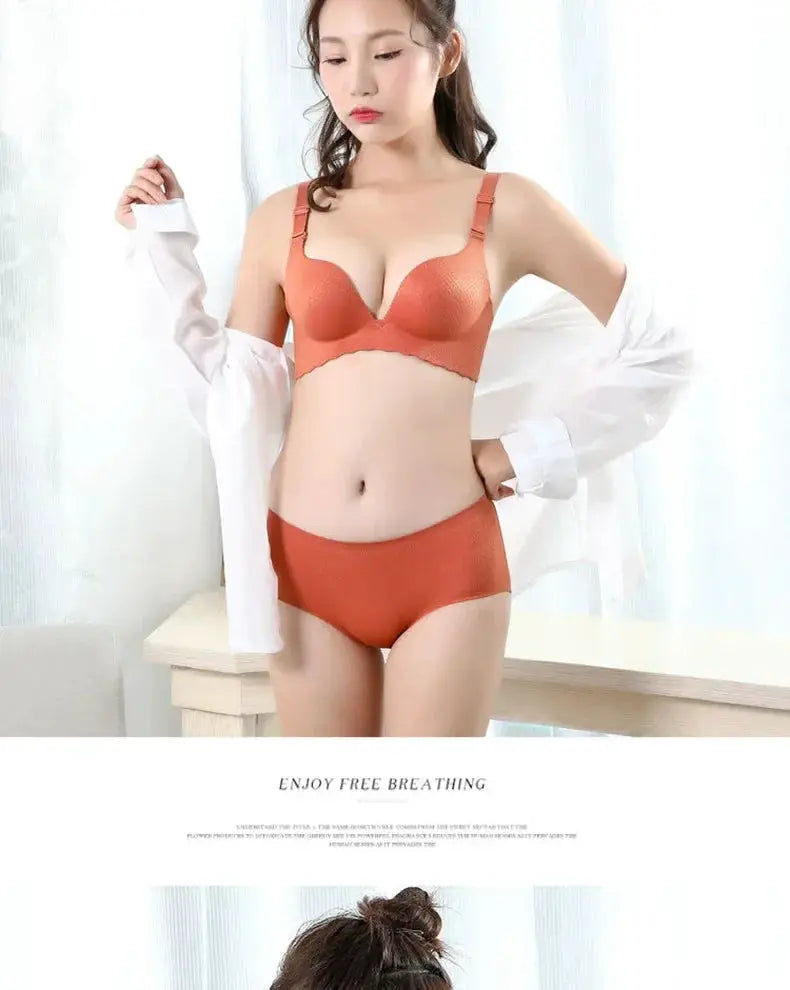 Simples Market orange wireless push-up bra with matching briefs on a model