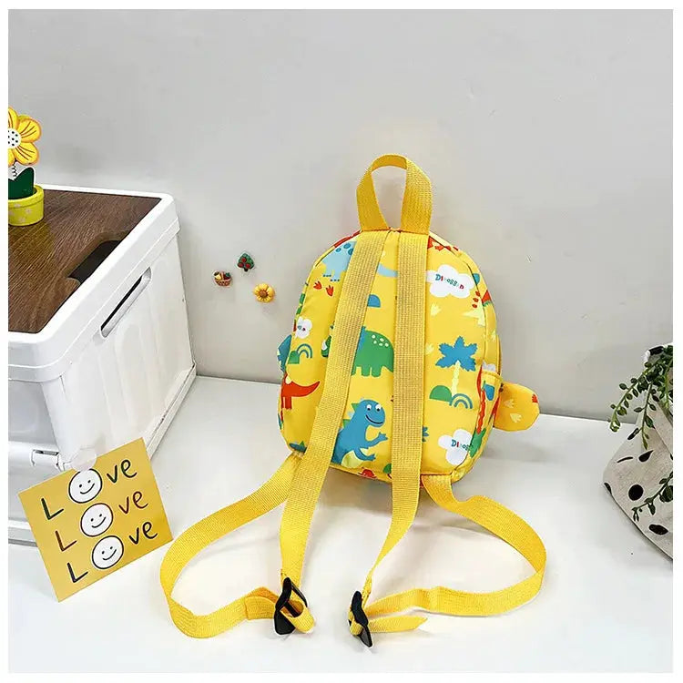 Kids dinosaur cartoon backpack in yellow with adjustable straps