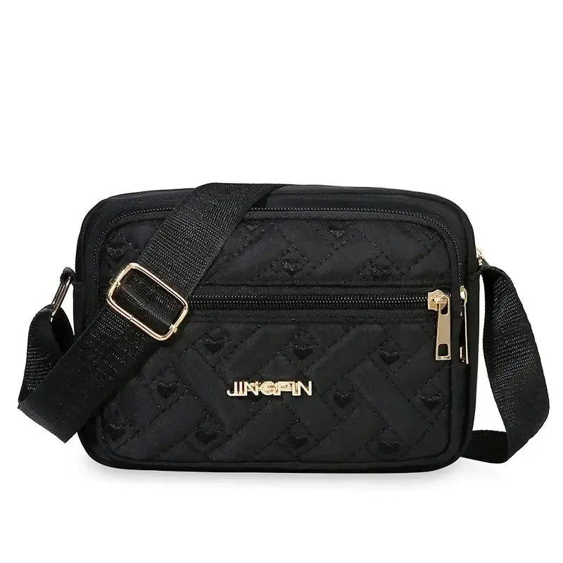 Crossbody bag black quilted with gold zippers, adjustable strap, JINGPIN logo