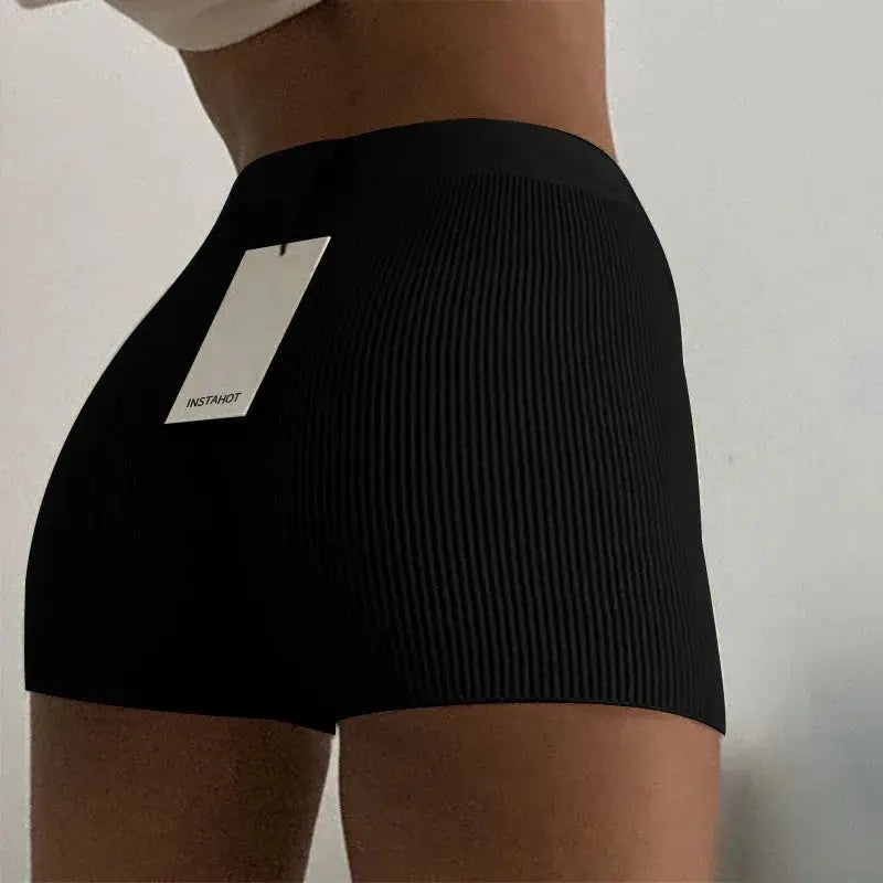 Women's black ribbed knit high-waist shorts back view