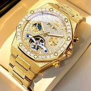 OLEVS gold-tone steel men's luxury watch with diamond-studded bezel, exposed tourbillon, and metal bracelet.