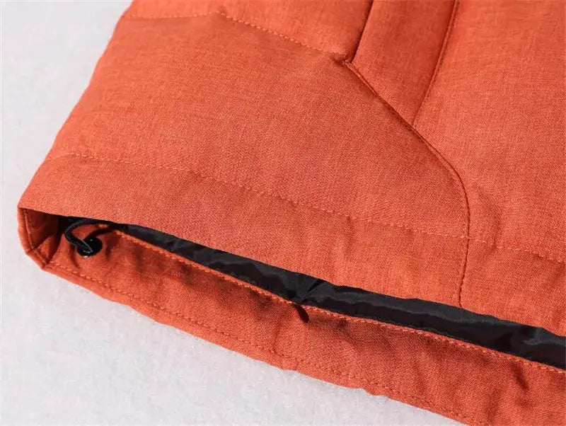 Men's orange down jacket hem with black inner lining and adjustable drawcord