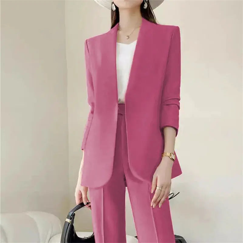 Pink 2-piece women's suit set by Simples Market with blazer-style coat and matching tailored pants