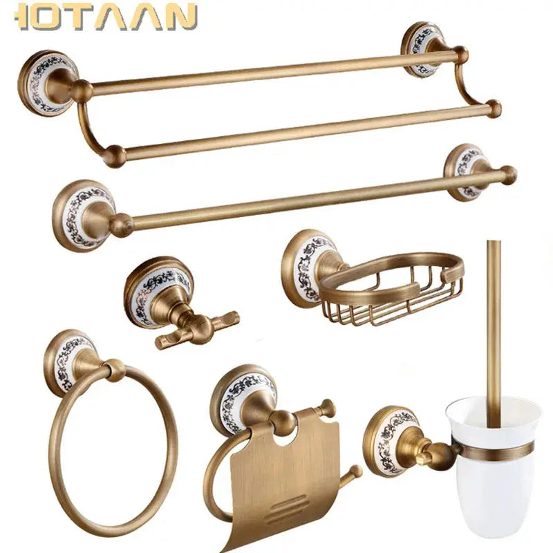 Simples Market antique brushed brass bathroom set with porcelain rosette mounts; multi-piece twin towel bars and ring.