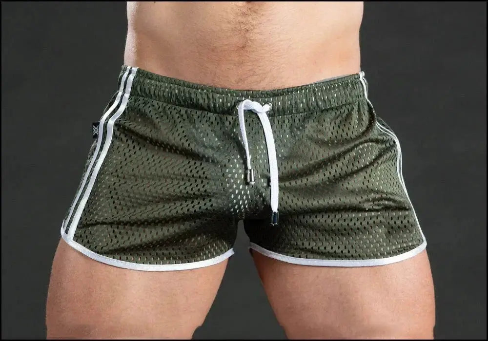 Men's green grid-mesh running shorts with white drawstring and piping; breathable quick-dry gym shorts