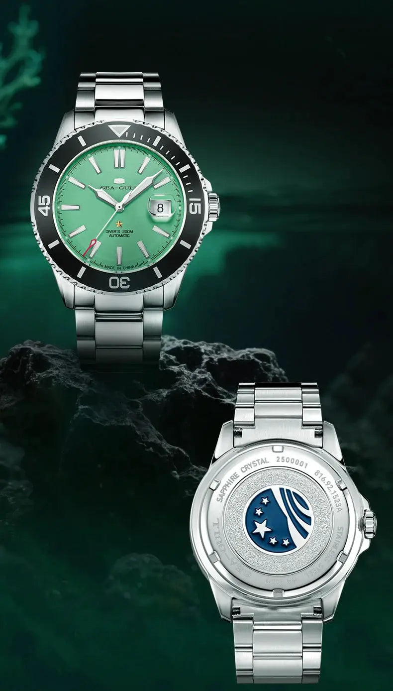 Two Sea-Gull men's diving watches with stainless steel bands; one green-dial, the other with blue emblem on case back.