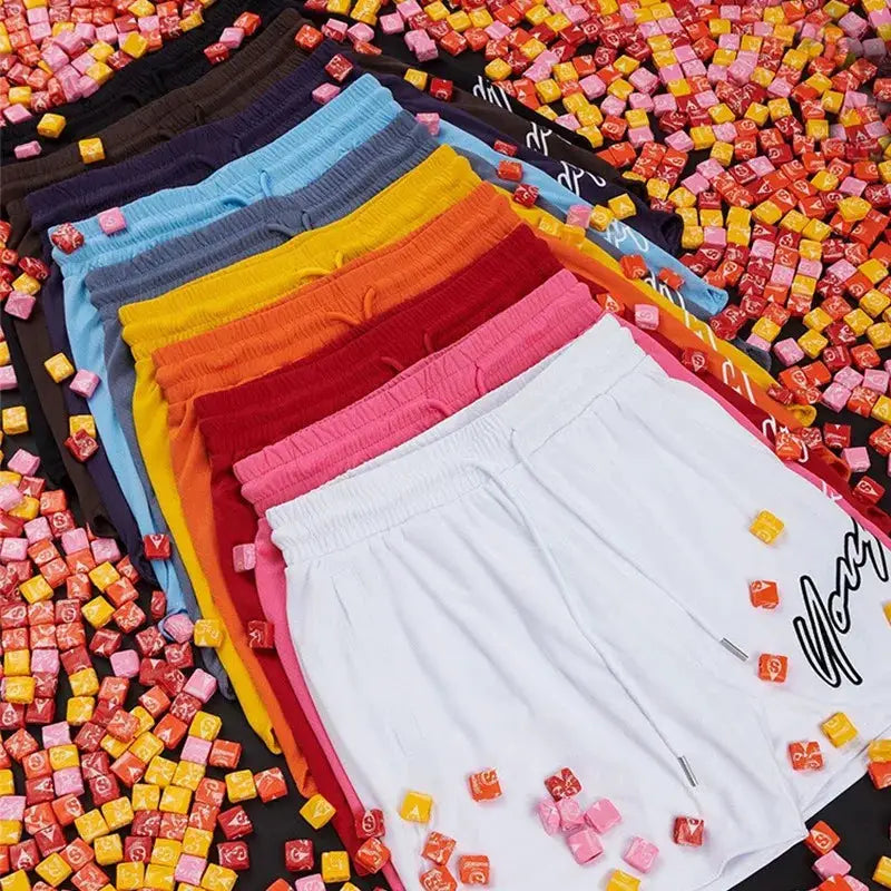 Trend men's mesh beach swim shorts in white and rainbow colors; quick-dry, loose-fit.