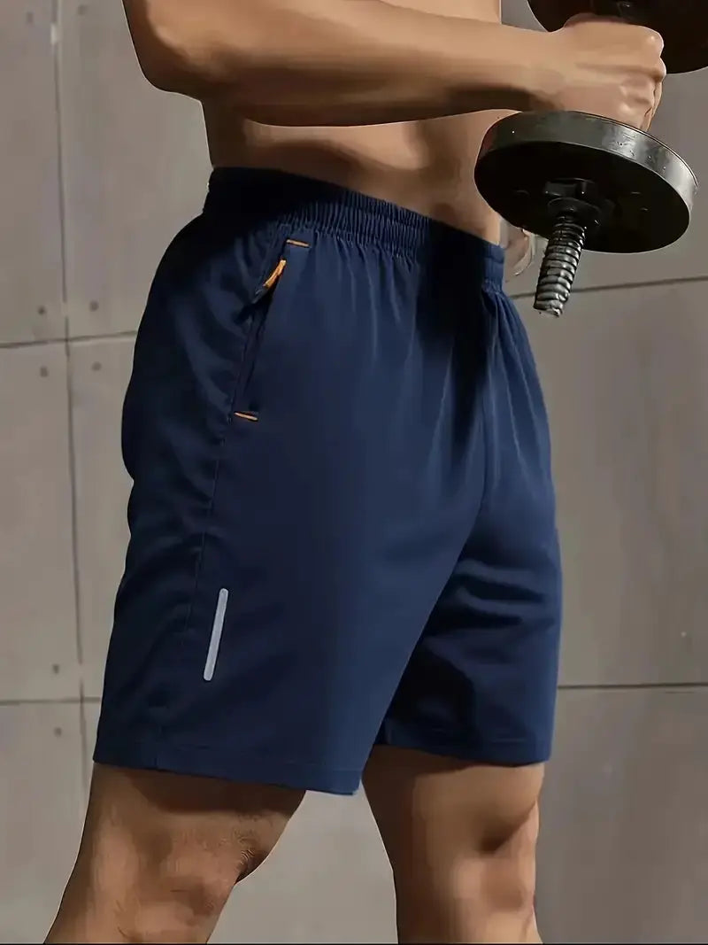 Men's navy sports shorts by Simples Market with elastic waist, orange zipper pocket and breathable fabric.