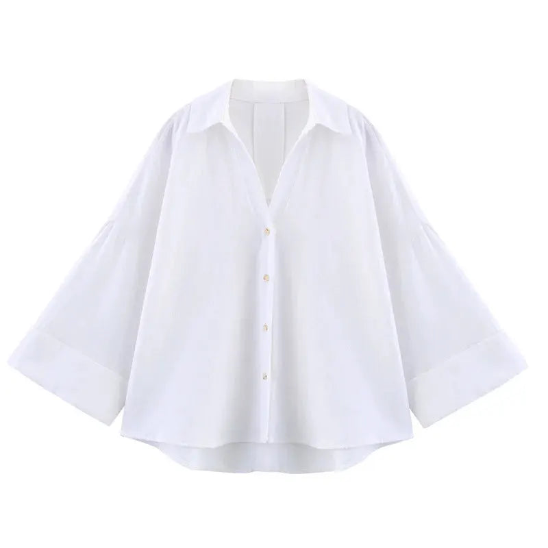 Women's white loose shirt with collar, button-down front and wide sleeves by Simples Market.