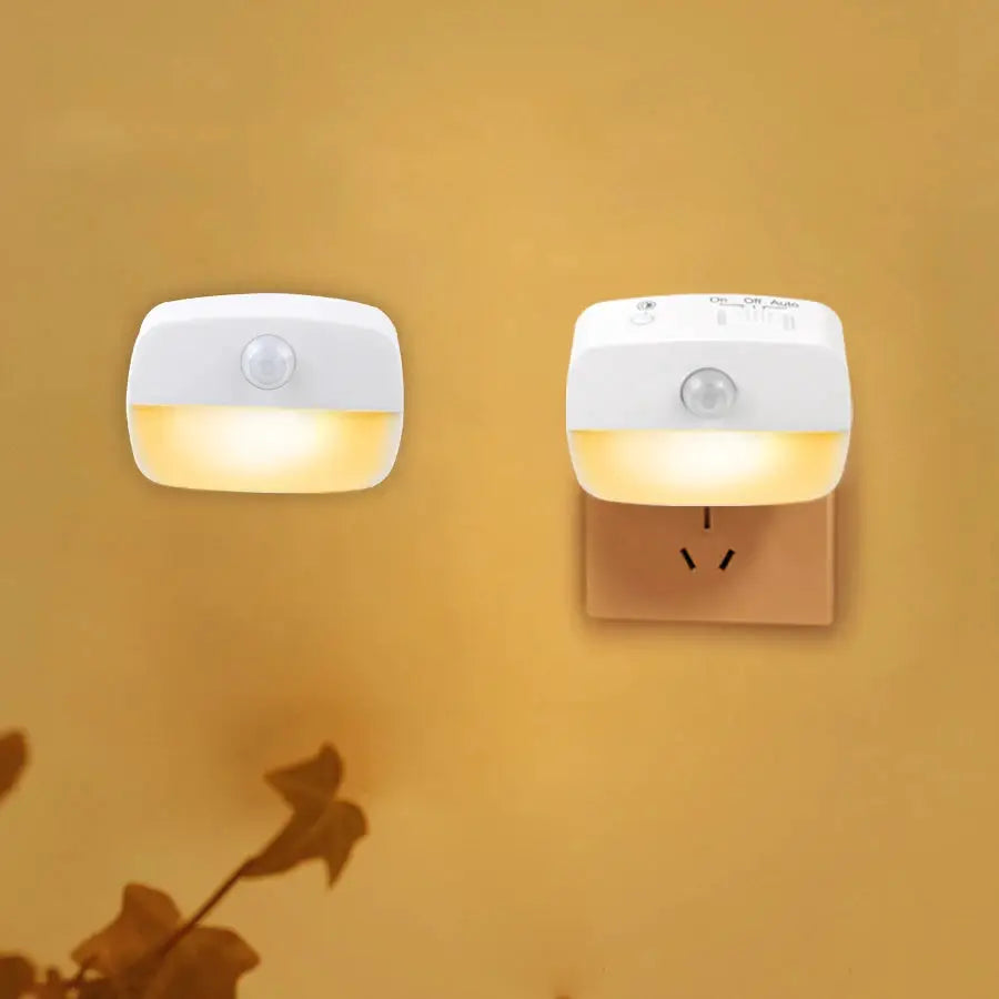 Wireless LED motion-sensor night lights, white plug-in units with auto mode, warm glow; set of 2