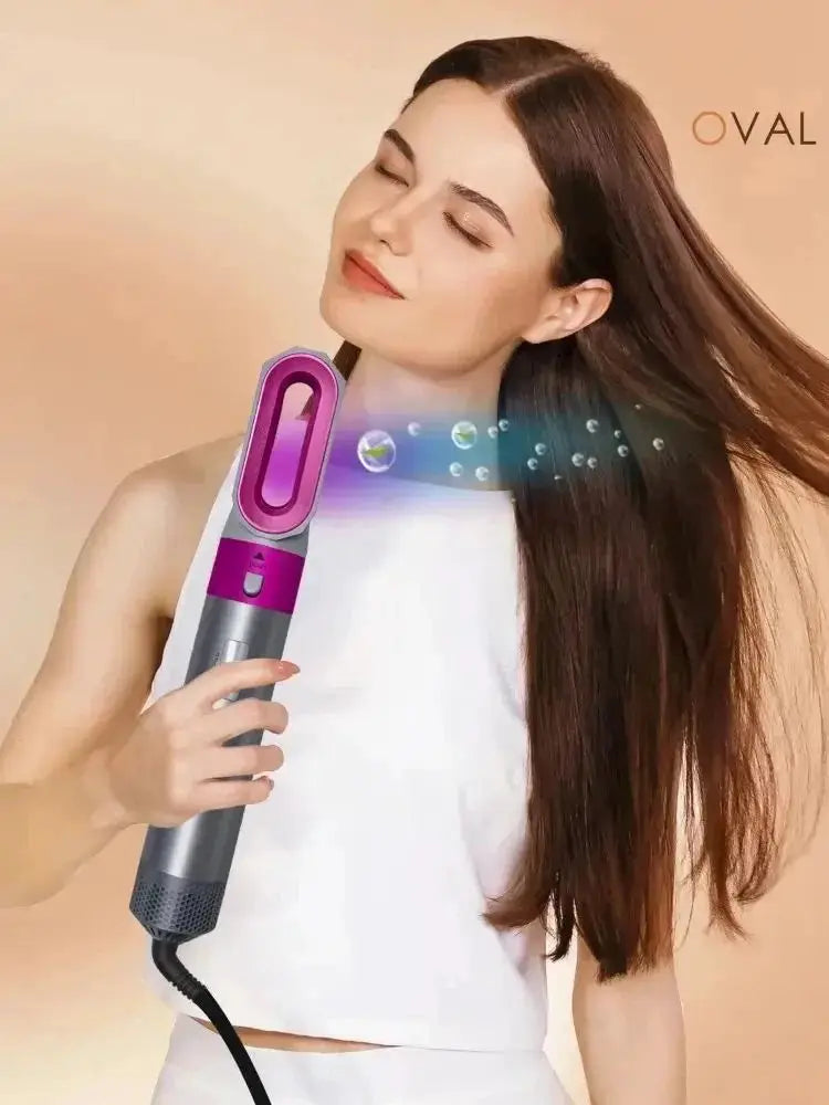 5-in-1 hair styler with pink front panel and gray body, corded ionic dryer hot comb brush