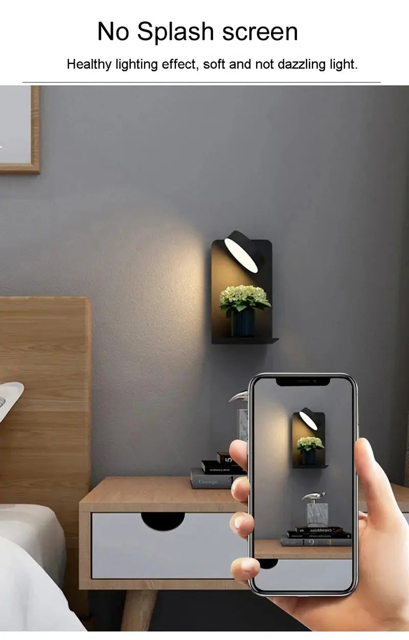 Bedroom LED wall lamp with USB charging; black modern sconce with white oval shade on gray wall.