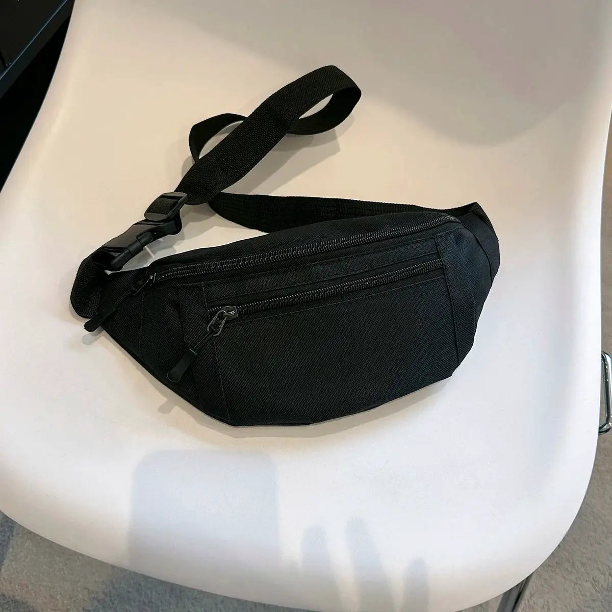 Fanny pack by Simples Market, black nylon waist bag with adjustable strap and dual zip pockets