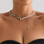 Simples Market Y2K heart beaded choker necklace with crystal beads and a silver heart pendant, with dangling chain tassels.