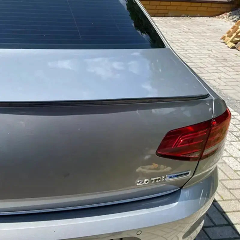 Passat rear trunk spoiler lip for VW B6-B8 (2005–2021), black soft plastic