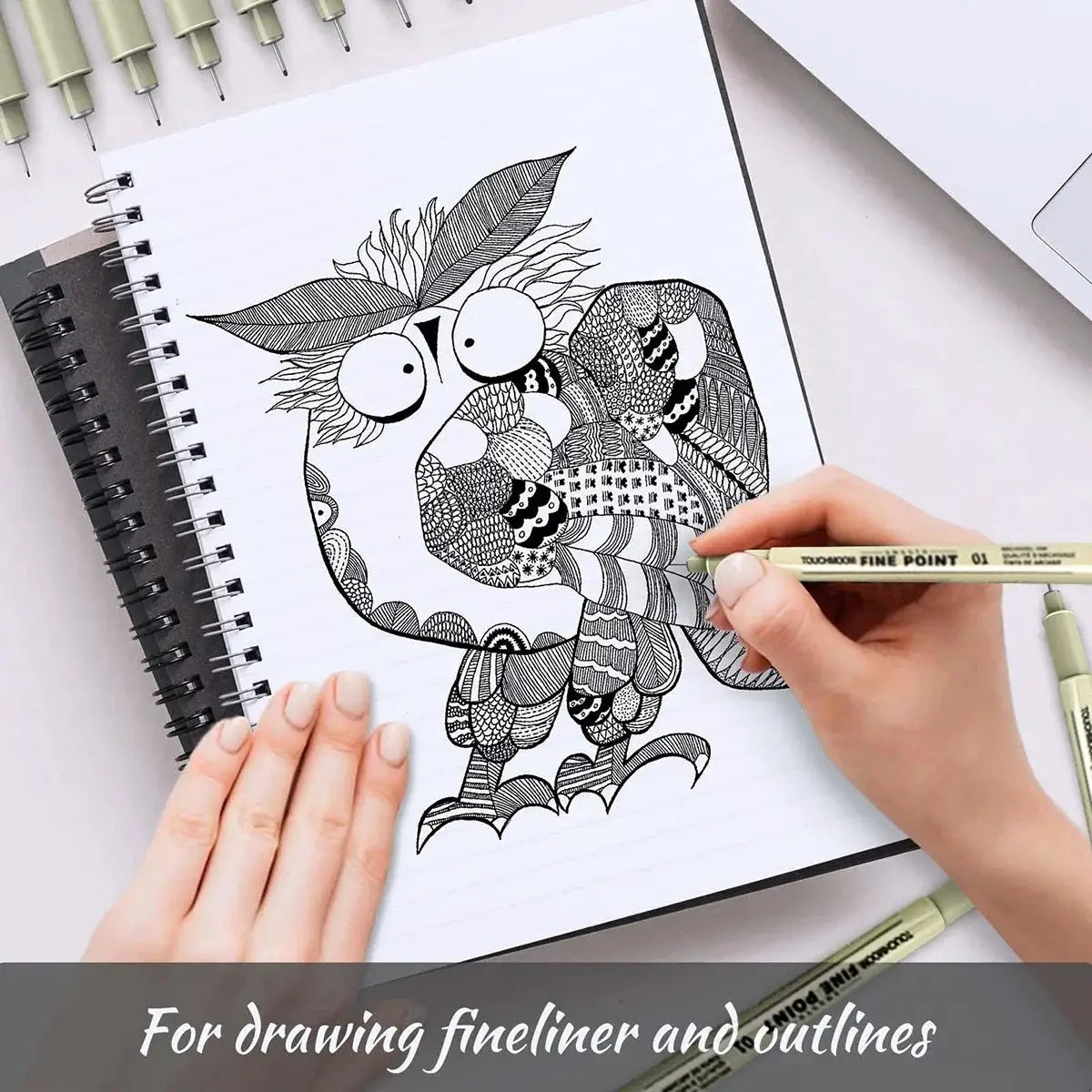 Fineliner pen set, 6–12 pcs in pastel green, shown with a hand-drawn owl on a notebook