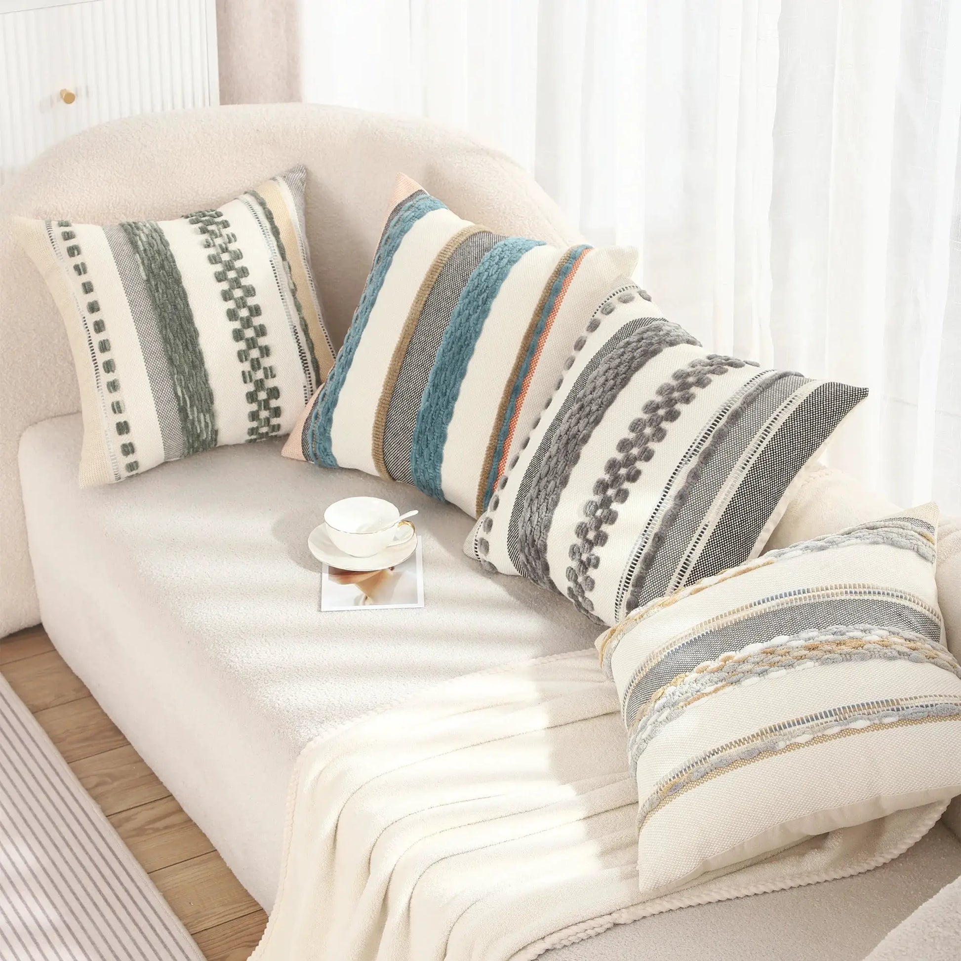 Boho striped chenille pillow covers 18x18 by Simples Market on a cream sofa