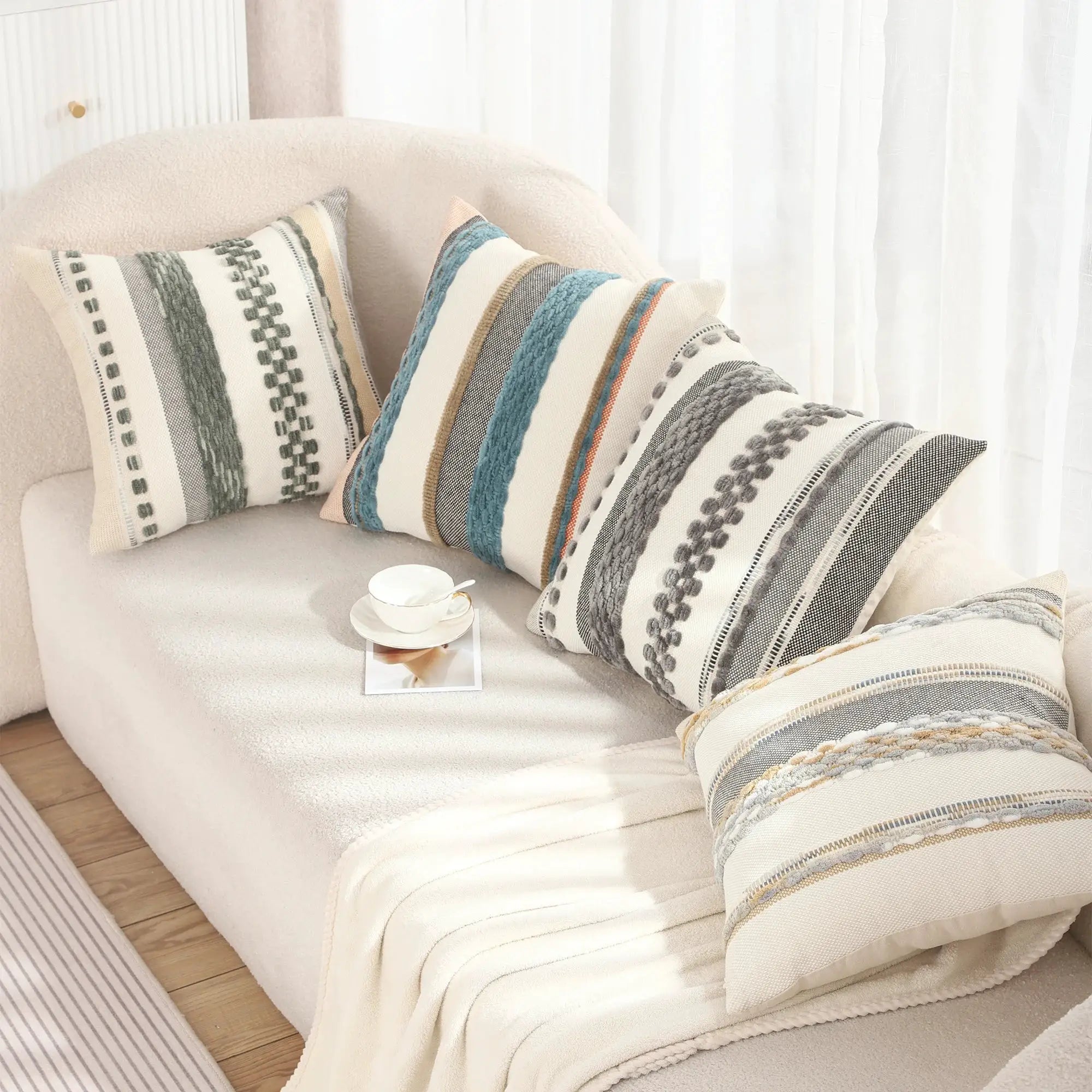 Boho striped chenille pillow covers 18x18 by Simples Market on a cream sofa