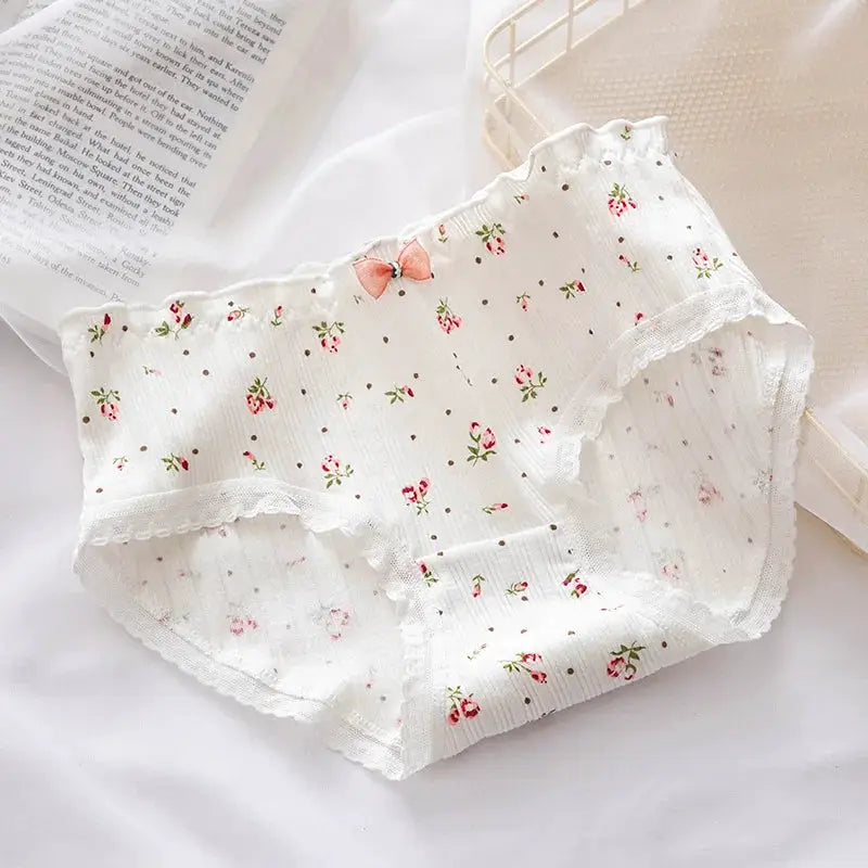 Women’s cotton panties mid-waist with floral print, lace trim, and a pink bow
