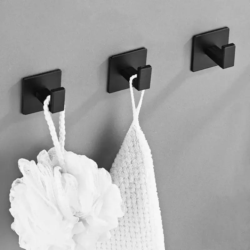 Black adhesive bathroom wall hooks (3-pack) with square bases for towels, coats, and keys.