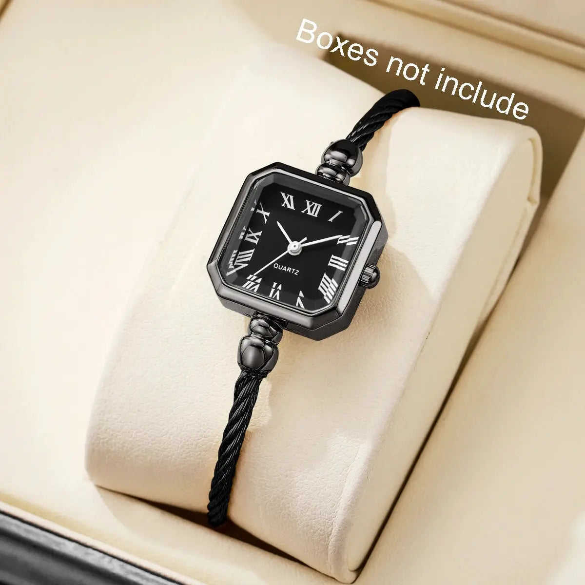 Women's square-dial quartz wristwatch with Roman numerals and black bracelet strap.