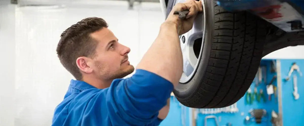 Simples Market universal tire valve core remover tool with slotted handle used on a car tire