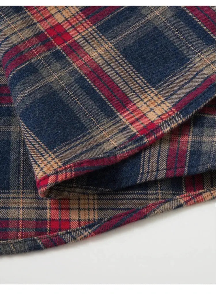 Flannel shirt plaid fabric in navy, red and beige; 100% cotton.