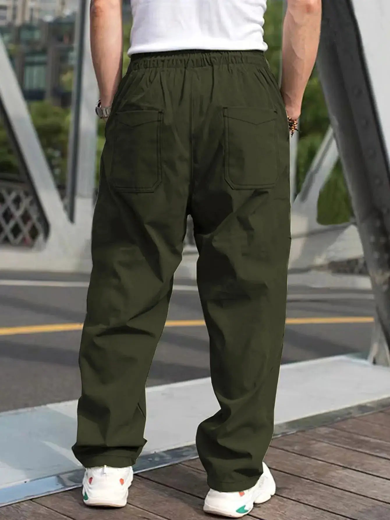 Men's olive cargo pants with drawstring waist and back pockets, straight-leg casual trousers
