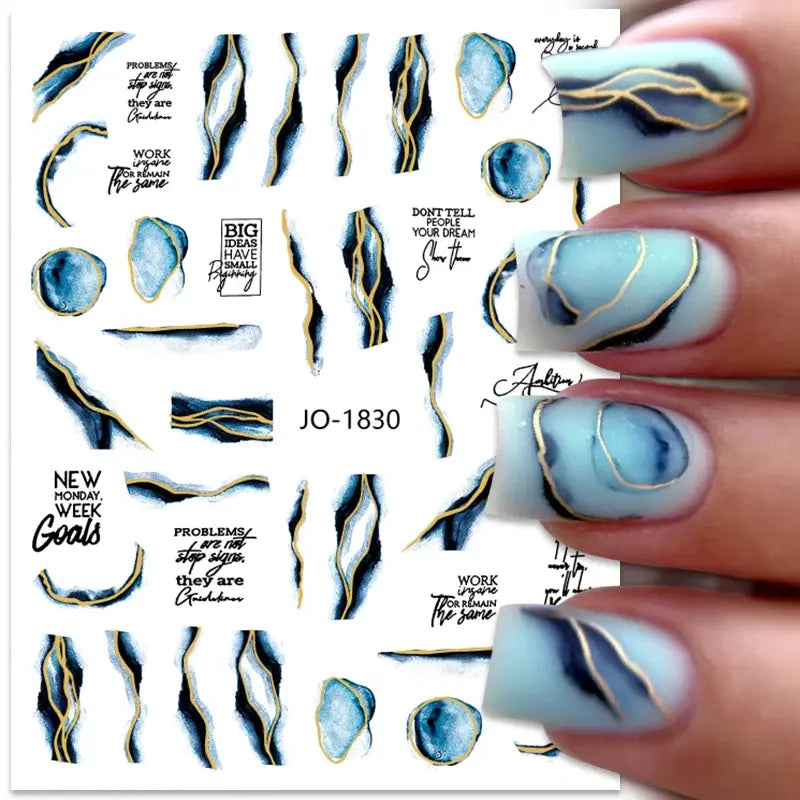 Nail art decals sheet by Simples Market; blue marble with gold striped geometric lines and floral accents