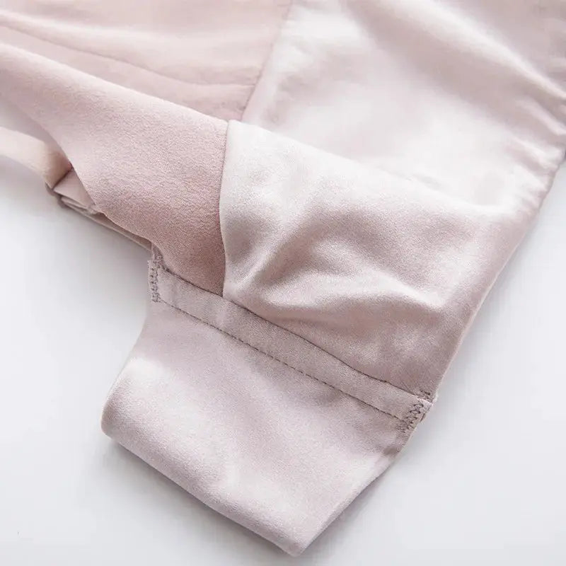 Birdtree pink silk-spandex bralette fabric close-up; wireless, non-padded