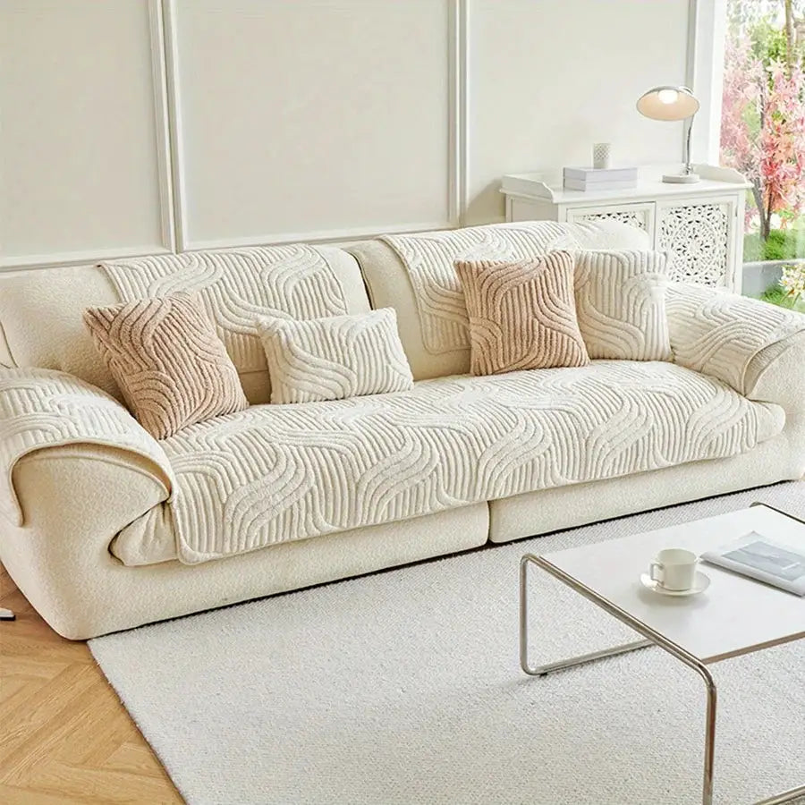 Velvet sofa cover in cream with a striped pattern and non-slip fabric, plus matching cushions by Simples Market.