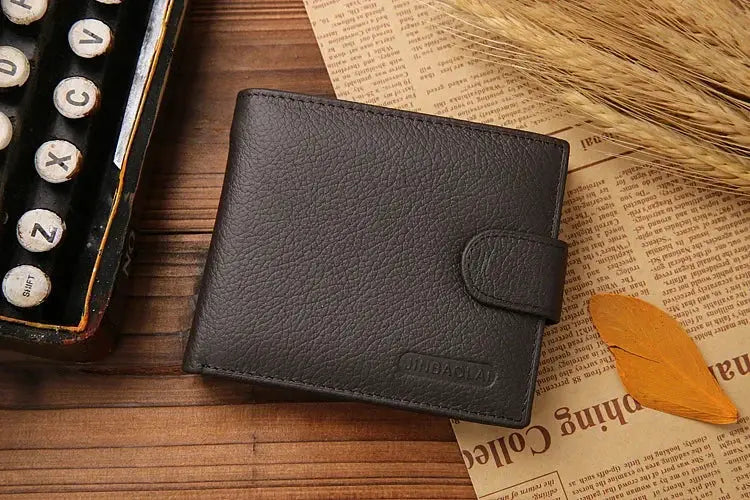 Simples Market leather men's wallet in black cowhide with strap closure