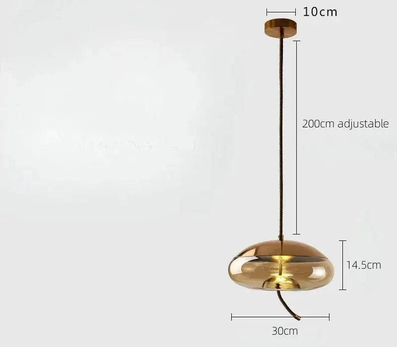 Pendant lamp with copper-gold glass shade on hemp rope, adjustable up to 200 cm, 30 cm wide.