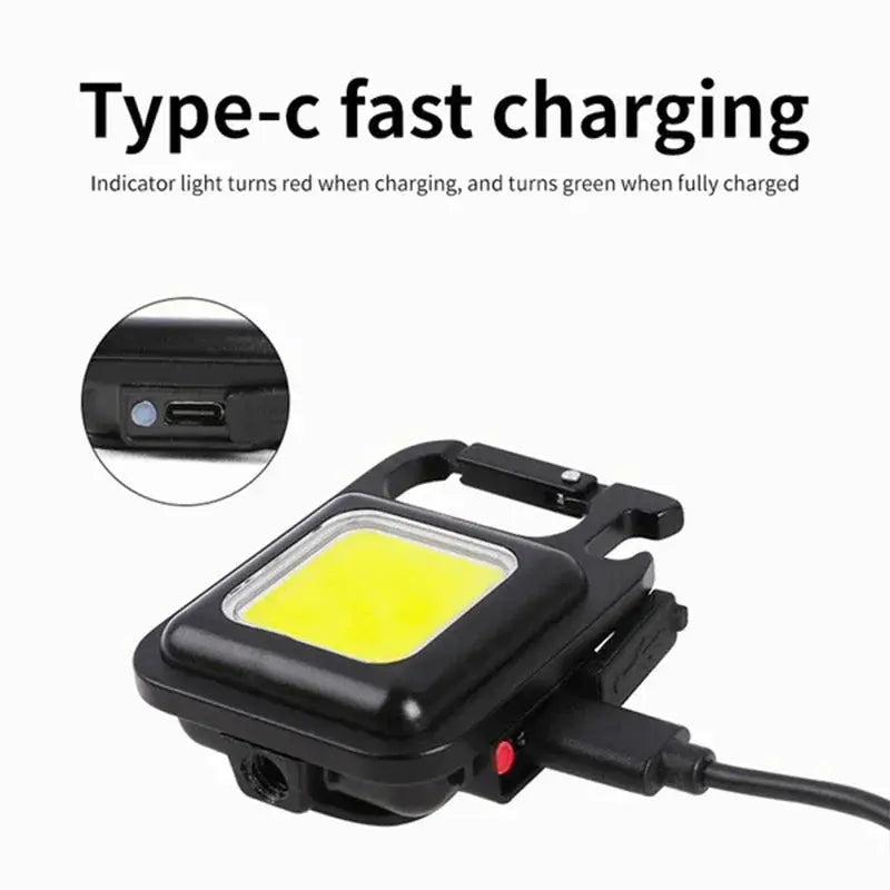 Keychain light from Simples Market: mini USB rechargeable LED flashlight with COB panel, black with pocket clip.