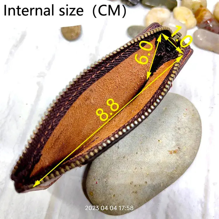 Simples Market mini zipper waist bag; brown leather belt pack for IDs, cards, passport and phone.