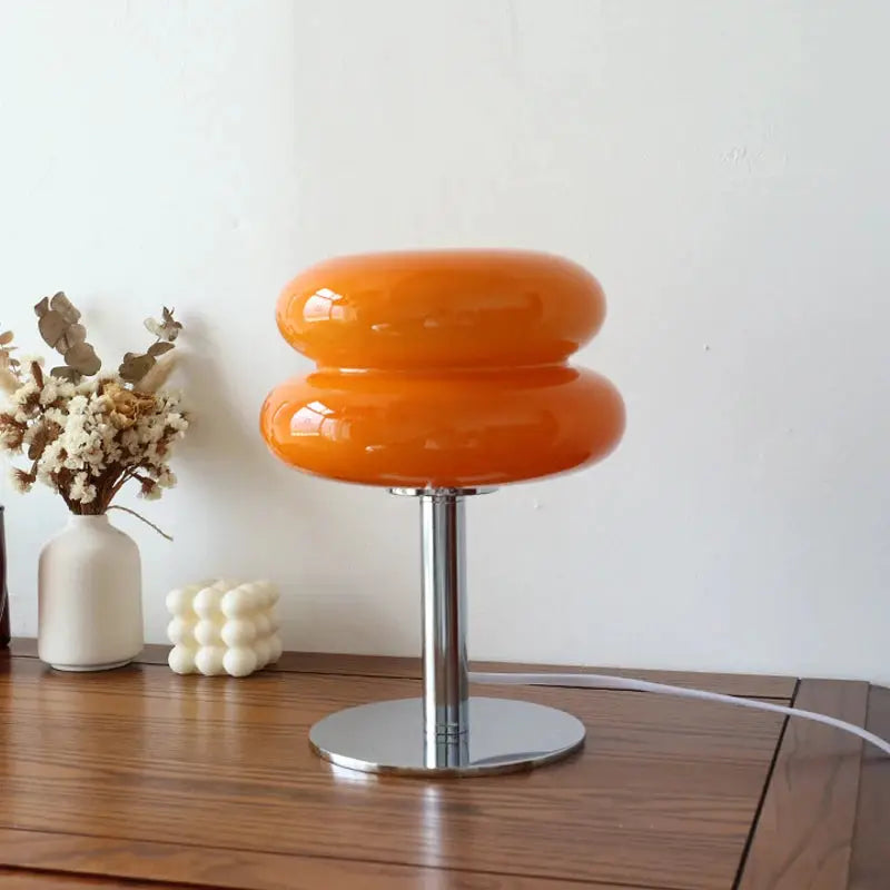 Macaron glass table lamp by Simples Market, orange glass shade on chrome pedestal