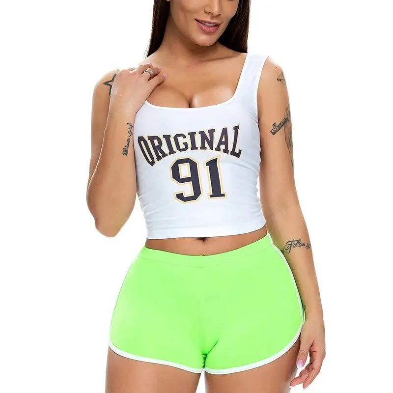 Women's neon green athletic shorts with white trim, ideal for workouts and casual wear.