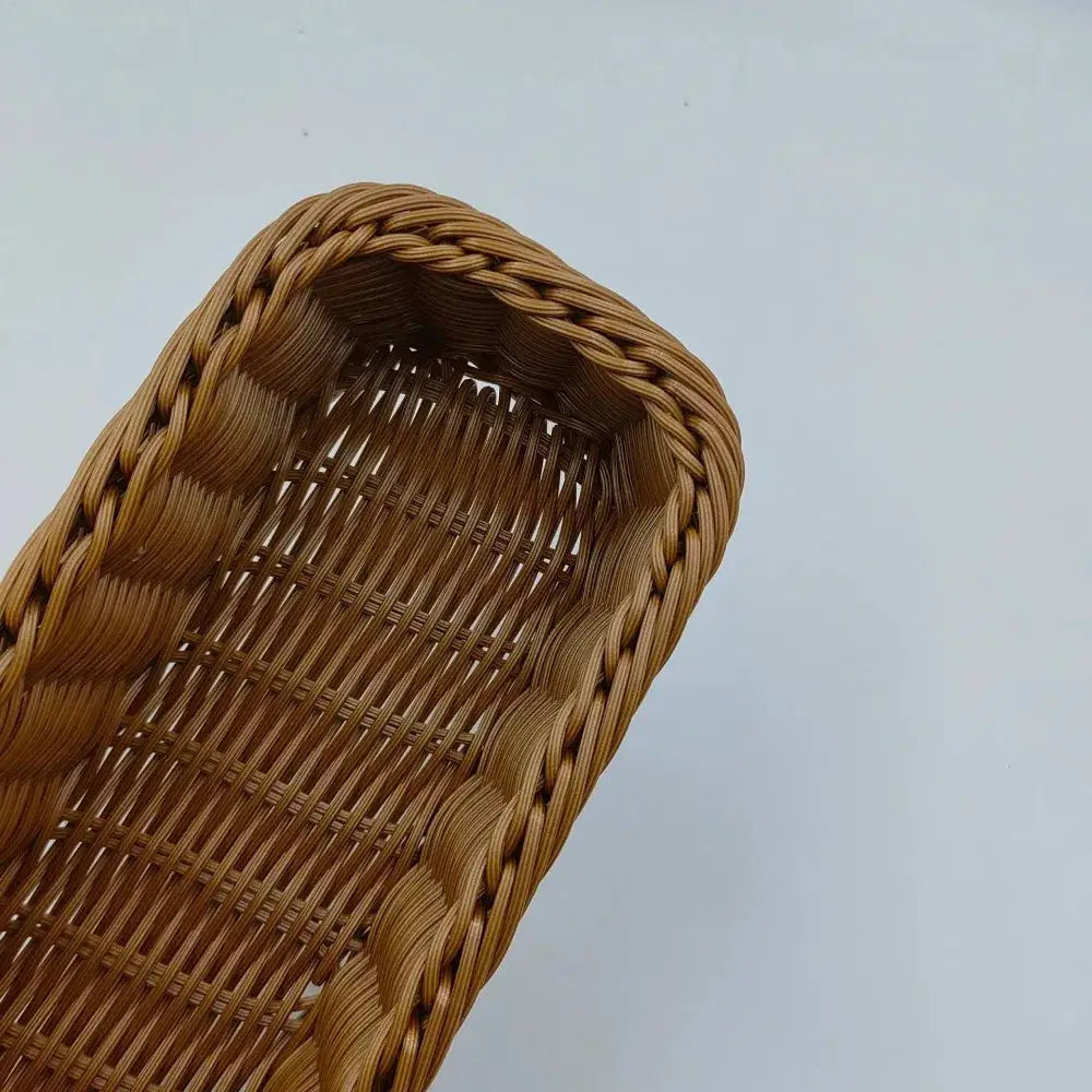 Imitation rattan storage basket in brown with a woven wicker design