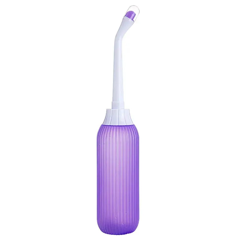 Portable bidet by Simples Market, purple ribbed bottle with white curved nozzle.