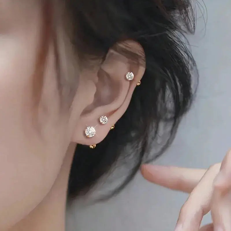 3Pairs Classic Round Zirconia Stud Earrings for Women in stainless steel worn on multiple ear piercings Simples Market